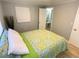 Comfortable bedroom with a view and en-suite bathroom at 1632 Gar St, St Cloud, FL 34771