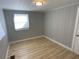 Spacious bedroom with light walls and wood-look floors at 1632 Gar St, St Cloud, FL 34771