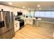 Modern kitchen with stainless steel appliances and an island at 1632 Gar St, St Cloud, FL 34771