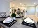 Modern kitchen with stainless steel appliances and white shaker cabinets at 1632 Gar St, St Cloud, FL 34771