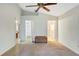 Primary bedroom with walk-in closet and bathroom access at 1677 Slash Pine Pl, Oviedo, FL 32765