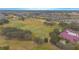 Expansive aerial view of a golf course with manicured fairways and greens at 1987 Key Bay Trl, Kissimmee, FL 34747