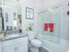 Clean bathroom with a bathtub and shower at 1987 Key Bay Trl, Kissimmee, FL 34747