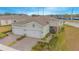 Well maintained home boasting a paver driveway and beautiful landscaping at 1987 Key Bay Trl, Kissimmee, FL 34747