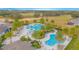 Expansive community pool with surrounding lounge areas at 1987 Key Bay Trl, Kissimmee, FL 34747