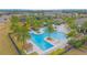 Community pool with multiple lap lanes and lounging areas at 1987 Key Bay Trl, Kissimmee, FL 34747