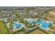 Large community pool and spa with lounge areas at 1987 Key Bay Trl, Kissimmee, FL 34747