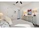 Bright bedroom with plush bedding and ample closet space at 2172 Temple Dr, Winter Park, FL 32789