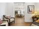 View of the dining room and wine cellar from the living area at 2172 Temple Dr, Winter Park, FL 32789