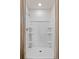 Clean shower stall with multiple shelves and curtain at 2223 Tongass Bnd, Davenport, FL 33896