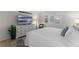 Spacious bedroom with a large bed and plenty of light at 2401 S Atlantic Ave # C306, New Smyrna Beach, FL 32169