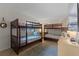 Bedroom with twin-over-twin bunk beds at 2401 S Atlantic Ave # C306, New Smyrna Beach, FL 32169