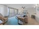 Living room with sectional sofa and ocean view at 2401 S Atlantic Ave # C306, New Smyrna Beach, FL 32169