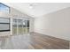 Bright bedroom with large windows and sliding glass doors at 2660 Bent Hickory Cir, Longwood, FL 32779