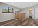 Upstairs hallway with wood-look floors and bathroom at 2660 Bent Hickory Cir, Longwood, FL 32779