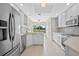 Modern kitchen featuring updated appliances and ample cabinet space at 2660 Bent Hickory Cir, Longwood, FL 32779