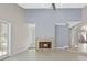 Spacious living room with a cozy stone fireplace and high ceilings at 2660 Bent Hickory Cir, Longwood, FL 32779