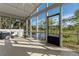 Relaxing screened porch overlooking pond at 2660 Bent Hickory Cir, Longwood, FL 32779