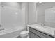 Bathroom with a shower/tub combo and gray vanity at 2789 Ruby Rose Ln, St Cloud, FL 34771