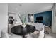 Modern dining area with black round table and gray chairs at 3330 Thicket St, Tavares, FL 32778