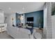 Spacious living room features a neutral color palette and plenty of natural light at 3330 Thicket St, Tavares, FL 32778