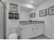 Double vanity bathroom with a shower and granite countertop at 3332 Thicket St, Tavares, FL 32778