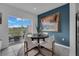 Kitchen dining area with a round table and chairs, and view of the patio at 3332 Thicket St, Tavares, FL 32778