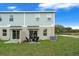 Cozy patio with two chairs and a fire pit, perfect for relaxing at 3332 Thicket St, Tavares, FL 32778