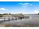 Serene waterfront view with community boat dock at 4113 Fairview Vista Pt # 208, Orlando, FL 32804