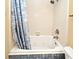 Bathroom with jetted tub and seashell shower curtain at 429 Copperstone Cir, Casselberry, FL 32707