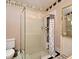 Updated bathroom with glass shower enclosure and modern vanity at 429 Copperstone Cir, Casselberry, FL 32707