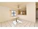 Bright dining area with kitchen views and tile flooring at 429 Copperstone Cir, Casselberry, FL 32707