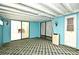 Bright Florida room with glass sliders and patterned carpet at 429 Copperstone Cir, Casselberry, FL 32707