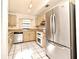 Efficient kitchen featuring wood cabinets and stainless steel appliances at 429 Copperstone Cir, Casselberry, FL 32707