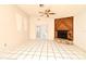 Living room with fireplace and French doors at 429 Copperstone Cir, Casselberry, FL 32707