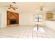 Living room features a wood-burning fireplace and tile floors at 429 Copperstone Cir, Casselberry, FL 32707