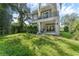 Modern home with a large backyard, patio, and plenty of green space at 433 Carolina Ave, Winter Park, FL 32789