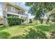 Modern home with spacious backyard, lush lawn, and patio at 433 Carolina Ave, Winter Park, FL 32789