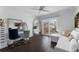 Bedroom with vanity, sitting area and sliding glass door to balcony at 433 Carolina Ave, Winter Park, FL 32789