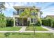 Modern two-story house with a landscaped lawn and walkway at 433 Carolina Ave, Winter Park, FL 32789