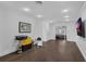 Spacious hallway with dark hardwood floors leading to bedrooms at 433 Carolina Ave, Winter Park, FL 32789