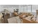 Open living space featuring light walls and tan leather furniture at 433 Carolina Ave, Winter Park, FL 32789