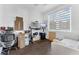 Bright home office featuring a standing desk and ample workspace at 433 Carolina Ave, Winter Park, FL 32789