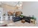 Open floor plan living room with kitchen and breakfast bar at 437 Prestwick Dr, Davenport, FL 33897