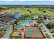 Community overview; view of pools, tennis courts, playground, and golf course at 4538 Cortland Dr, Davenport, FL 33837