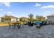 Spacious backyard with patio, fire pit, and seating area at 4538 Cortland Dr, Davenport, FL 33837
