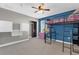 Cozy bedroom with bunk bed, built-in shelves, and ample closet space at 4538 Cortland Dr, Davenport, FL 33837
