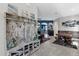 Bright entryway with a rustic bench, coat rack, and coastal-themed decor at 4538 Cortland Dr, Davenport, FL 33837