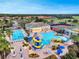 Community pool with water slide and plenty of lounge chairs at 4538 Cortland Dr, Davenport, FL 33837