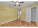 Bedroom with hardwood floors, closet, and motivational decor at 4689 Carmel St, Orlando, FL 32808